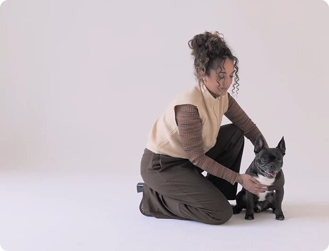 video poster of woman petting dog